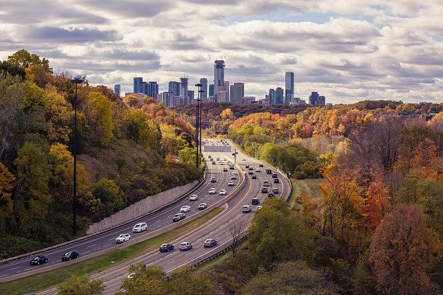 highway heading to a city