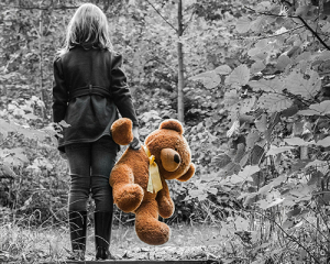 Girl Holding Teddy Bear