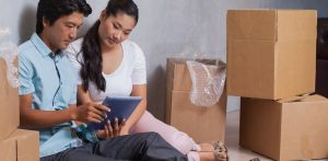 Couple Packing Boxes