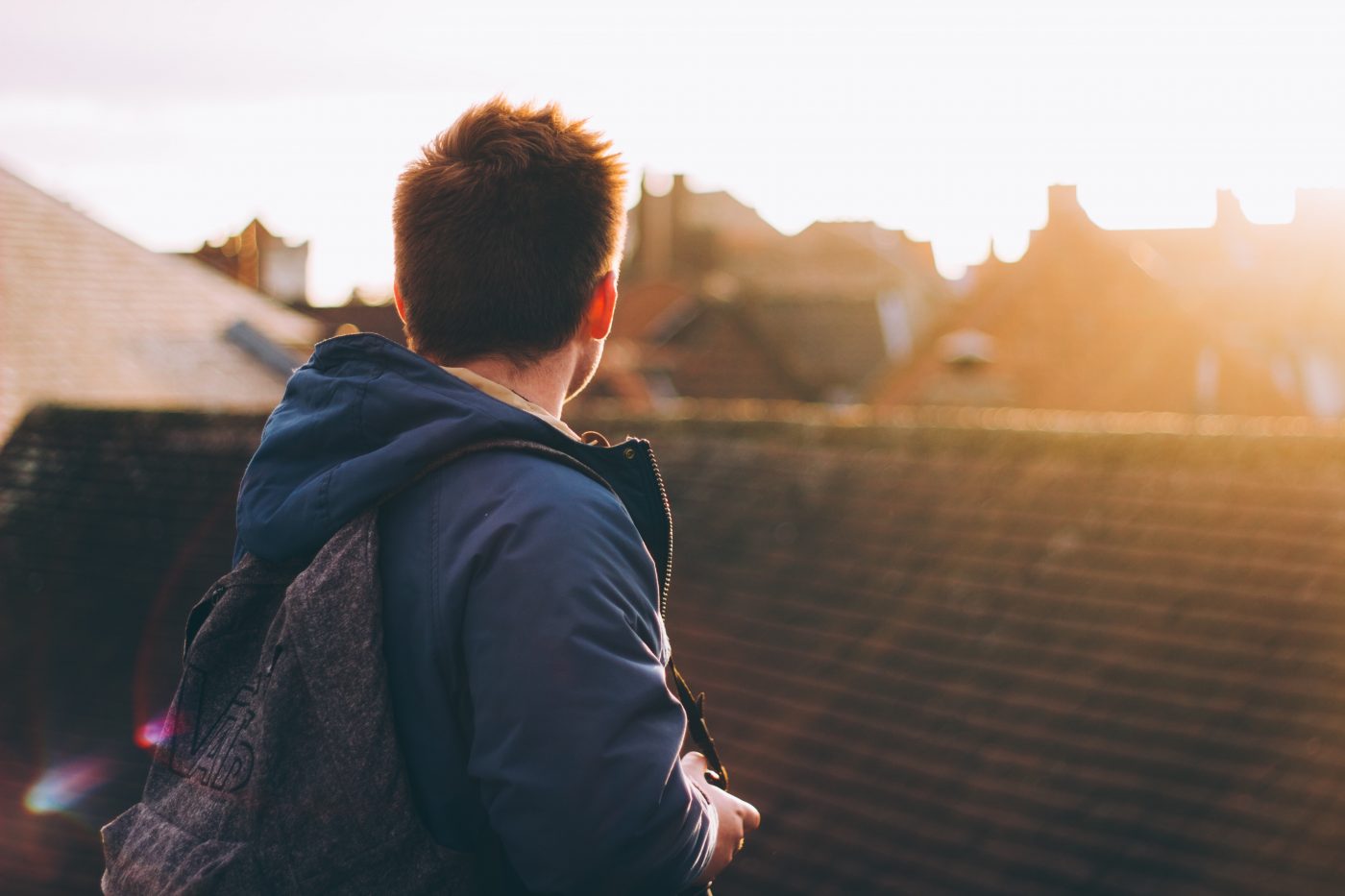 Man Looking At Neighborhood