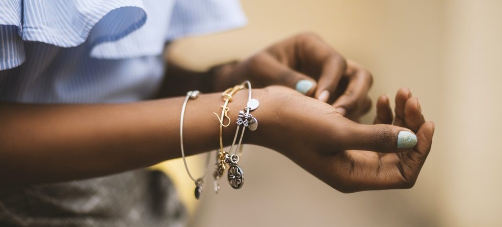 woman's arm with bracelets